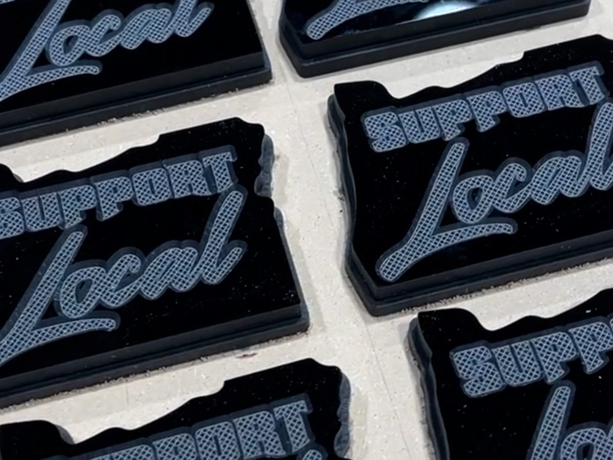 An array of 1/2 inch black acrylic showing detail of very small details