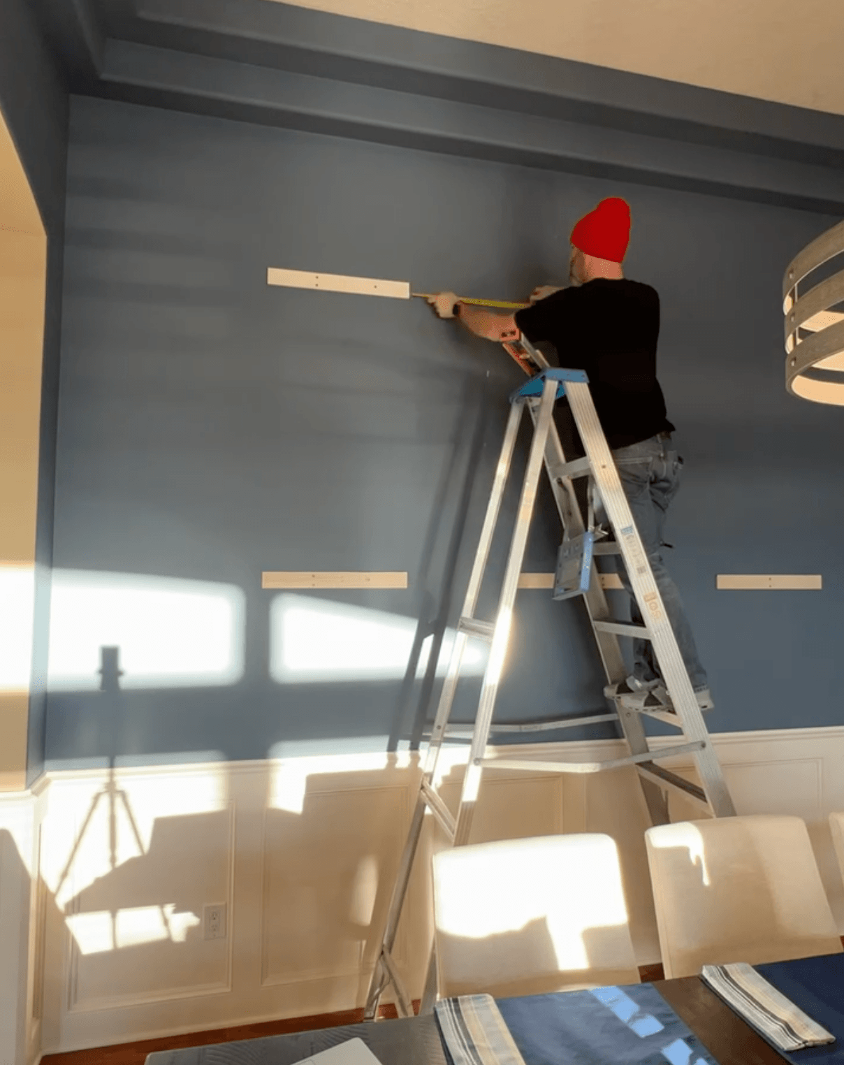 Double french cleat mounting system installed on the wall, ready to receive panels